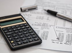 Calculator pen and sheets of paper